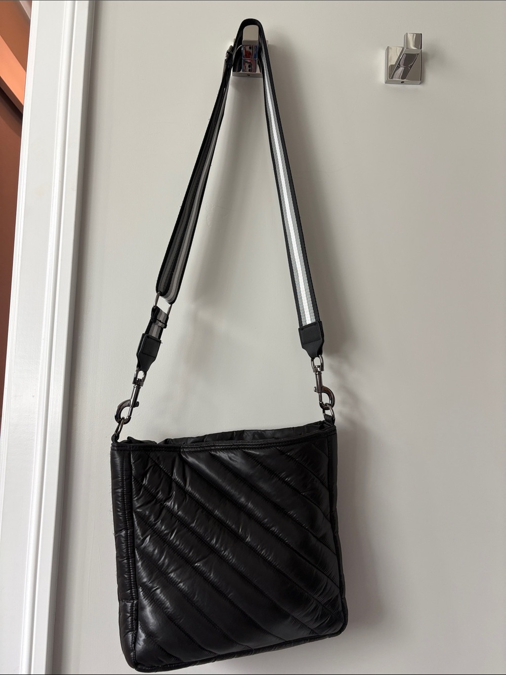 THINK ROYLN Black Quilted Crossbody Bag with Stripe Strap
